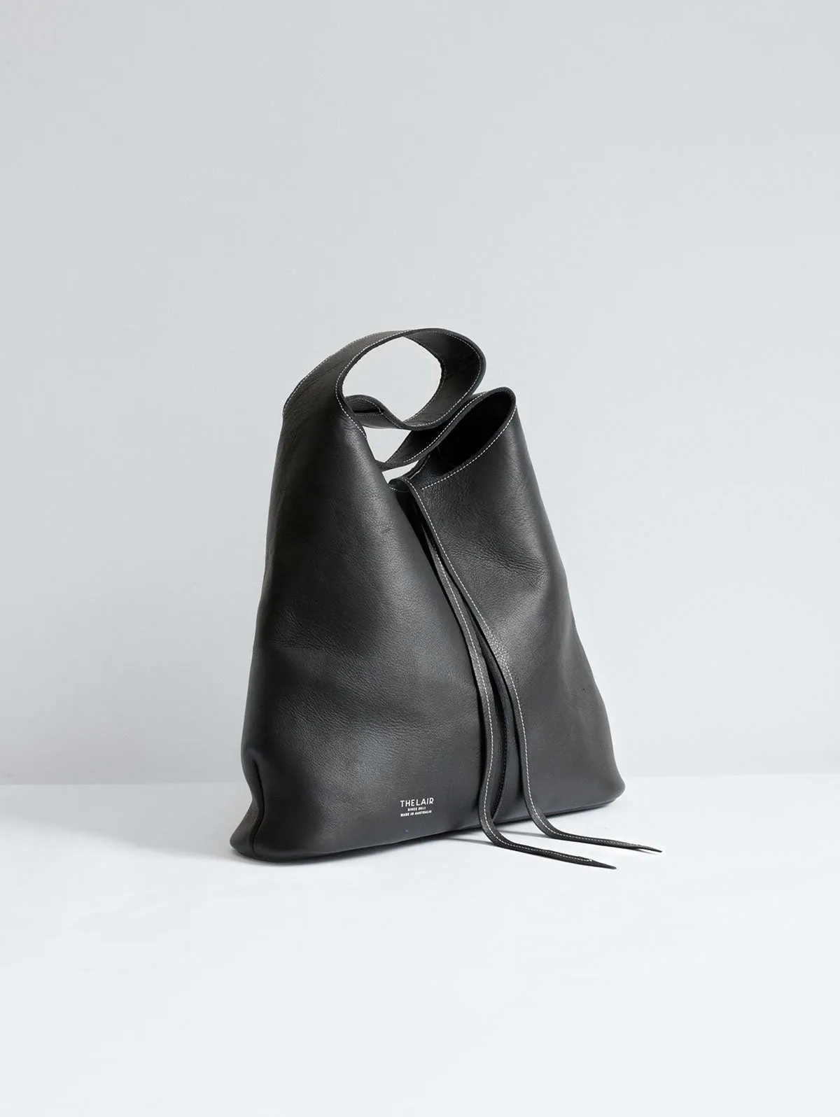 The Lair Suedo Sling Bag Large Black Silver